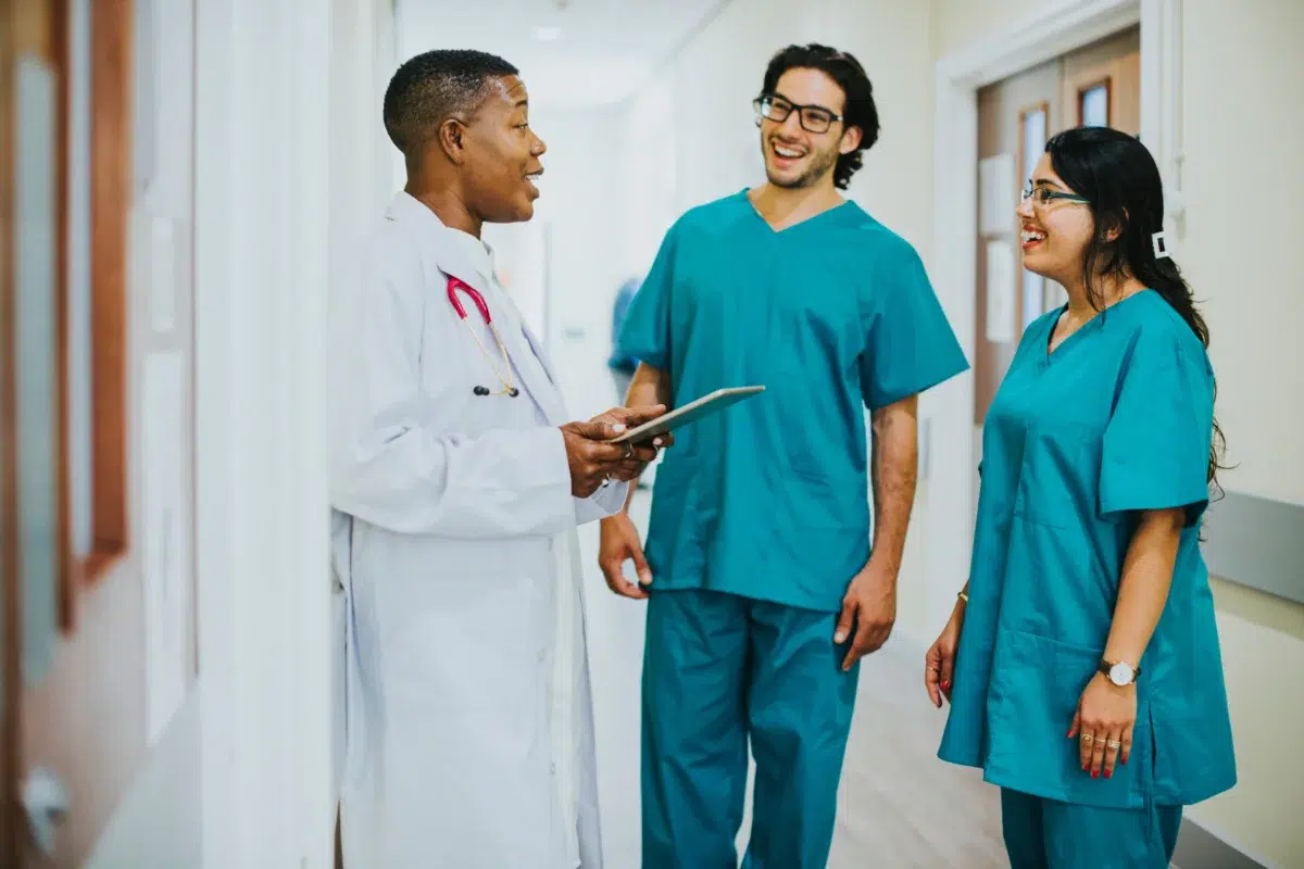 Doctors Talking in Hall